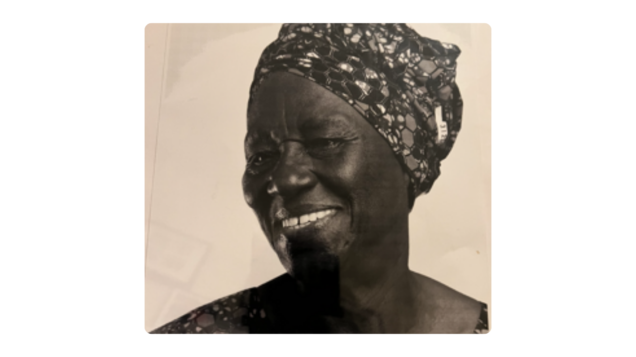 A sepia image of a woman smiling